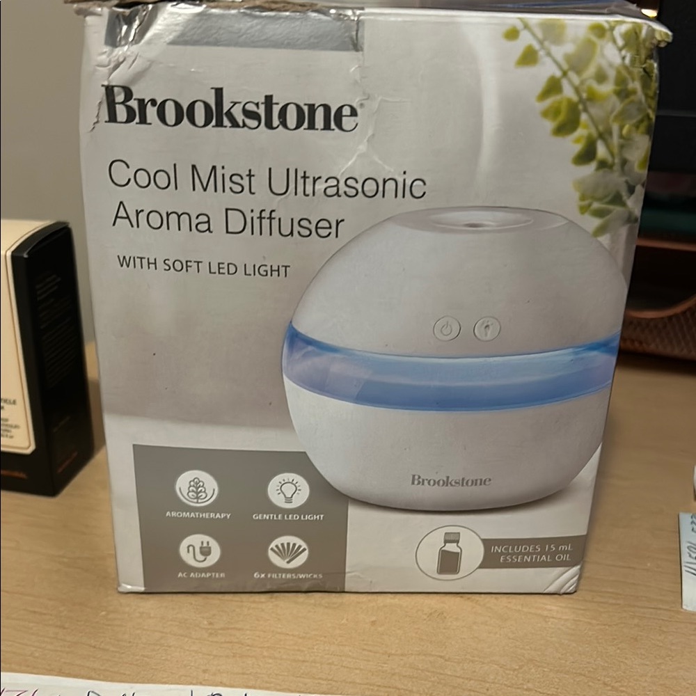 Brookstone Cool Mist Ultrasonic Aroma Diffuser-NEW
One sweet orange oil included